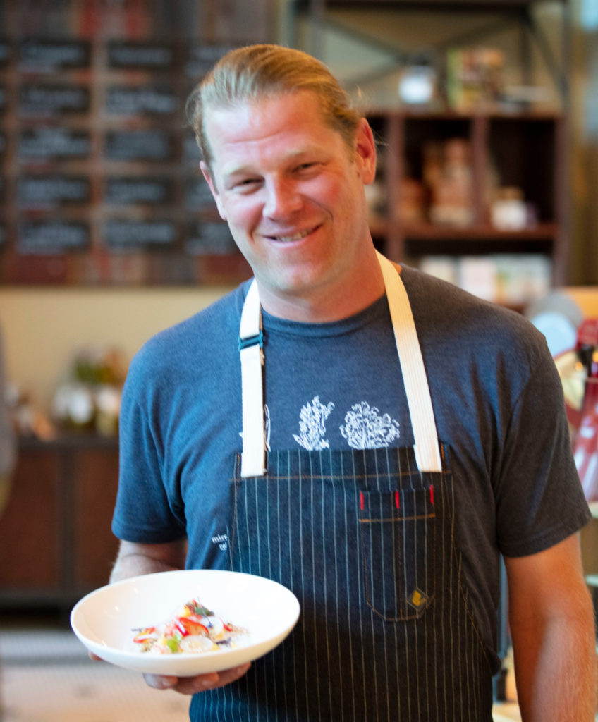 Alex Seidel with one of Mercantile's Seasonal dishes