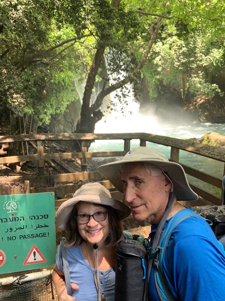 Sandy and Ira Bornstein at Herman Stream Waterfall in the Galilee; Image taken by Eric Tomer